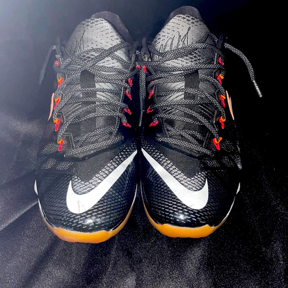 Exclusive black white and orange Nike flyweaves